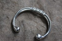 Rings Torc Bangle in Pewter. Photo